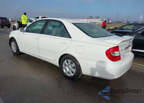 2003 Toyota Camry Le z USA, uszkodzony, nr VIN 4T1BE32K53U203341